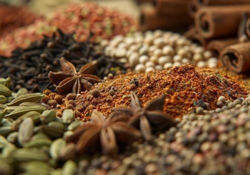in-this-image-a-variety-of-whole-gourmet-es-are-on-display-including-cumin-seeds-cloves-and-star-anise-the-different-shapes-sizes-and-textures-create-a-visually-intriguing-mix-photo